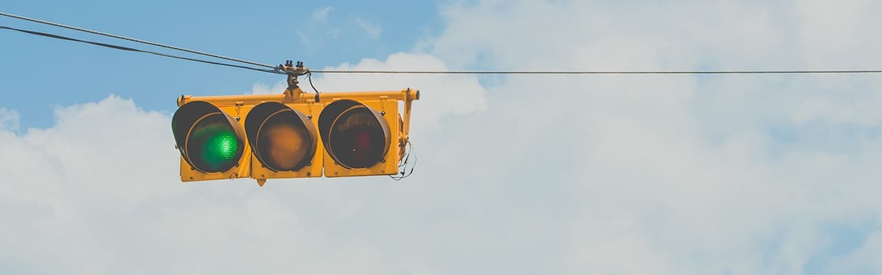 Traffic light graphic with the green light lit